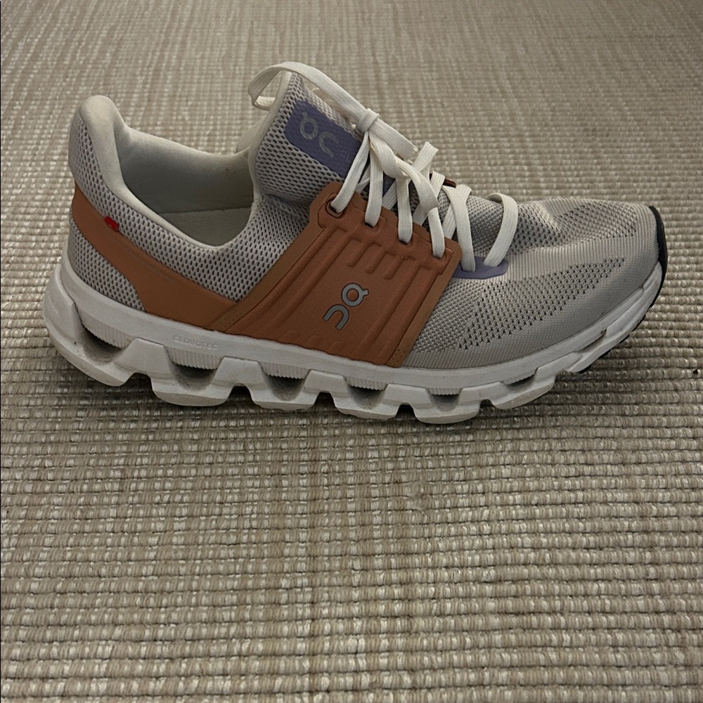 On Running White and Brown Athletic Shoes